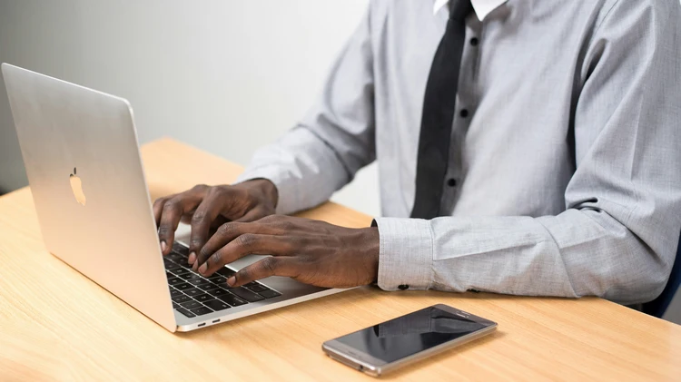 A professional Kenyan business website displayed on desktop and smartphone
